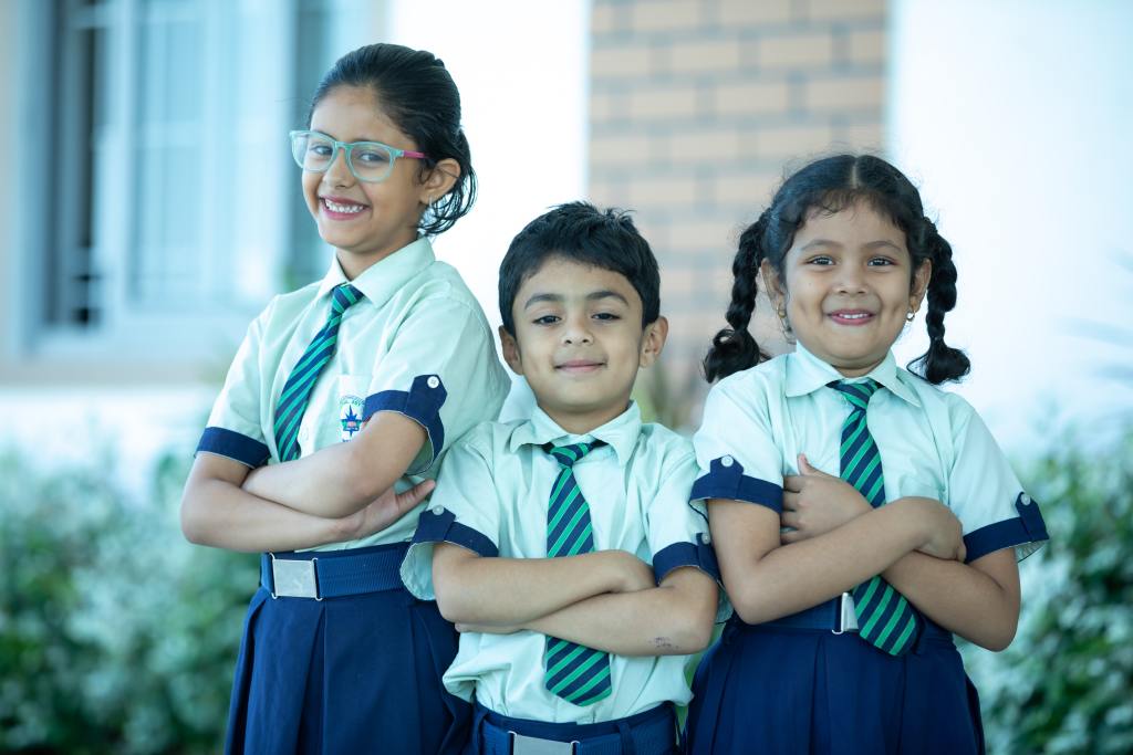 three young School children in unforms